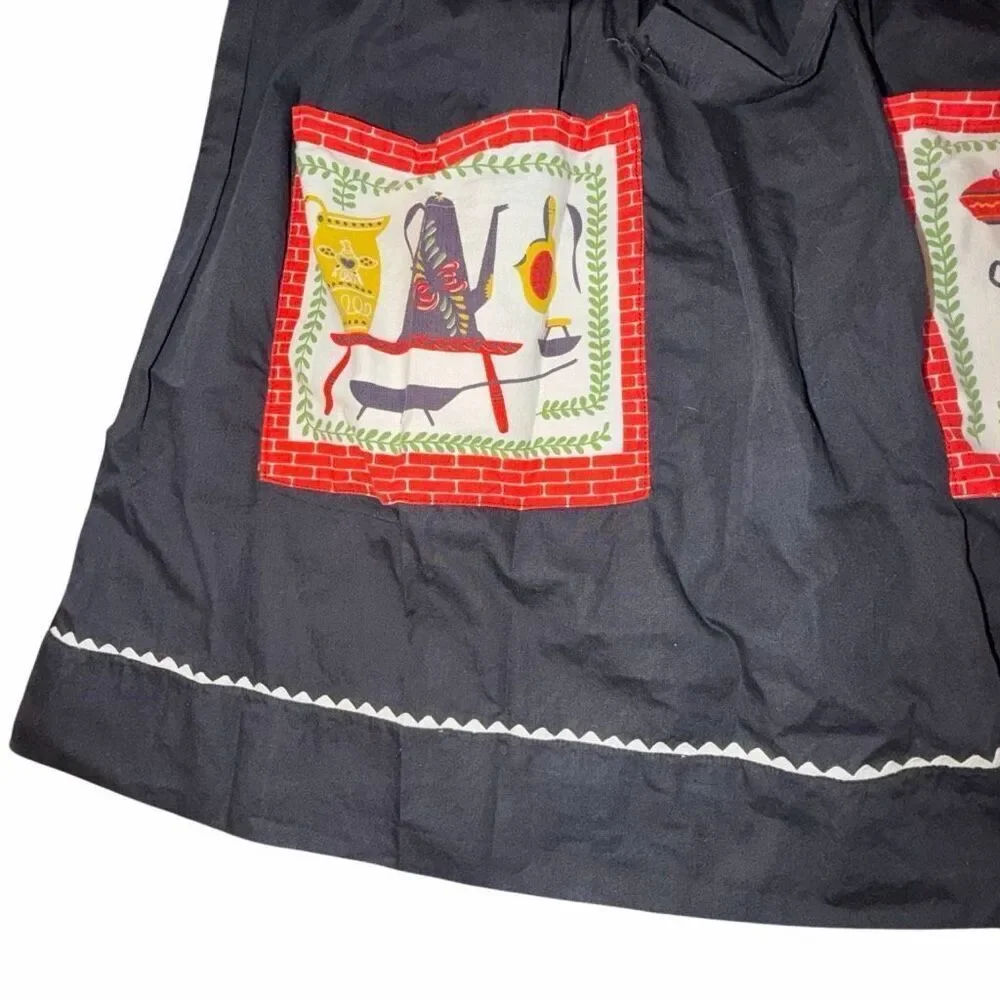 Vintage cottage core black apron w cast iron vessel pockets tie around waist